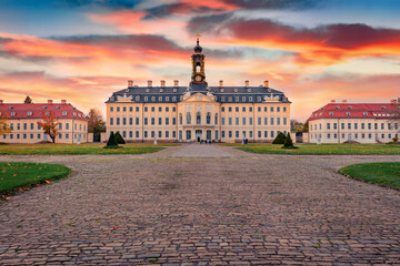 Picturesque sunrise on Hubertusburg castle (Exhibition Karl Hans Janke). Calm autumn scene of...
