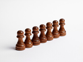 Chess pawns in a row. Business team and teamwork concept.