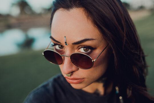 Magnificent trendy adult woman in sunglasses
