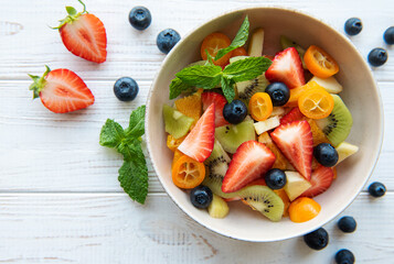 Healthy fresh fruit salad in a bowl