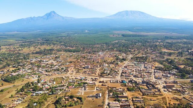 Mount kilimanjaro view . Small settlement of houses with Kilimanjaro background. Kilimanjaro Africa kenya Oloitokitok area.