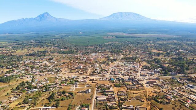 Mount kilimanjaro view . Small settlement of houses with Kilimanjaro background. Kilimanjaro Africa kenya Oloitokitok area.