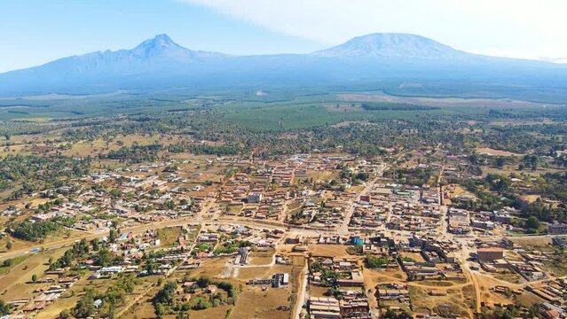 Mount kilimanjaro view . Small settlement of houses with Kilimanjaro background. Kilimanjaro Africa kenya Oloitokitok area.