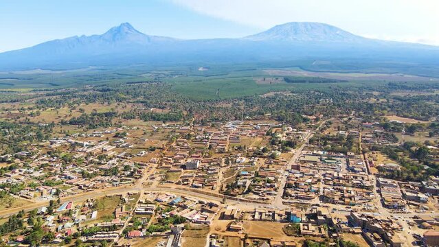 Mount kilimanjaro view . Small settlement of houses with Kilimanjaro background. Kilimanjaro Africa kenya Oloitokitok area.