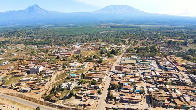 Mount kilimanjaro view . Small settlement of houses with Kilimanjaro background. Kilimanjaro Africa kenya Oloitokitok area.