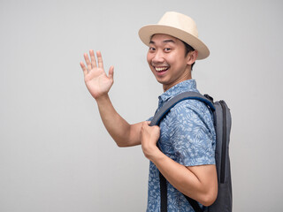 Positive asian man traveler turn around say hi,Tourism man hello © Thanasak