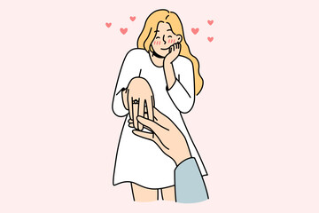 Happy young woman with ring on finger is engaged. Man holding female lover hand make marriage proposal. Ove and relationship. Vector illustration. 