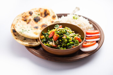 palak matar curry also known as spinach geen peas masala sabzi or sabji, indian food