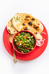 palak matar curry also known as spinach geen peas masala sabzi or sabji, indian food