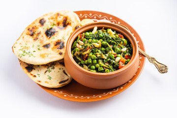 palak matar curry also known as spinach geen peas masala sabzi or sabji, indian food