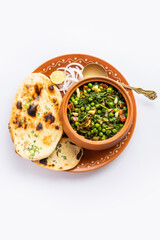 palak matar curry also known as spinach geen peas masala sabzi or sabji, indian food