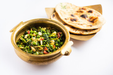 palak matar curry also known as spinach geen peas masala sabzi or sabji, indian food