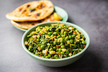 palak matar curry also known as spinach geen peas masala sabzi or sabji, indian food