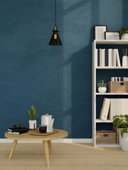 Trendy home living room interior with wood coffee table, modern bookshelf and stylish blue wall