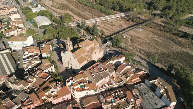 Aerial images of Tordera in the province of Barcelona, cathedral church dry European river