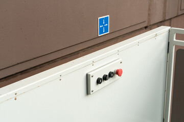 A mechanical device with a remote control and large buttons. Electrical selector switch, button...