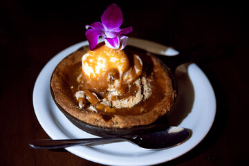 Cinnamon cake with ice cream on top