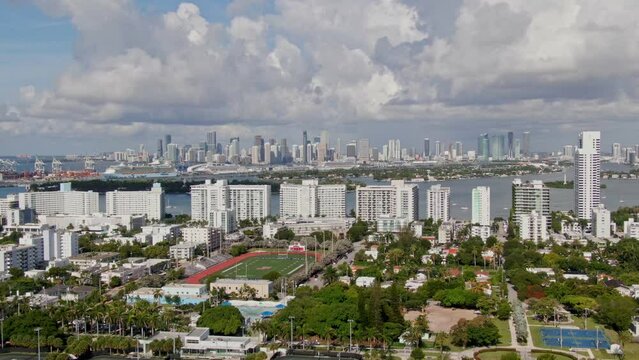 Miami skyline and suburb buildings, aerial dolly zoom effe