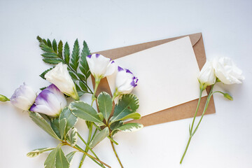 card mockup with shells and sea star leaves and eustoma

