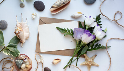Fototapeta na wymiar card mockup with shells and sea star leaves and eustoma 
