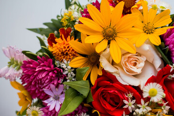 bouquet with vivid autunm flowers. water drops