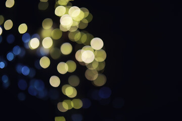 Abstract bokeh background. Golden bokeh circles on dark blue background. Layer overlay.
