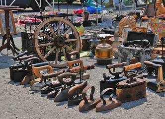 Various old objects on sale at the flea market on Piata Obor square, Sibiu, Romania.