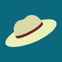 straw hat on green background