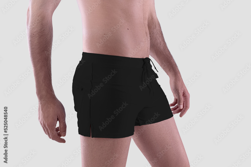 Poster Template of black trunks on athletic guy, boxers side view, isolated on background.