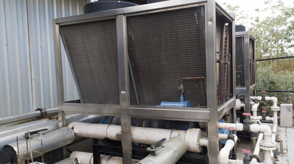 Fototapeta premium Industrial Air Cooled water chiller with piping, Industrial chiller machine old type.
