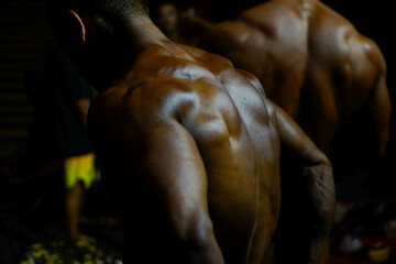 bodybuilder. body part details. bodybuilder in competition, detail.