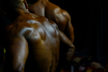 Fototapeta na wymiar bodybuilder. body part details. bodybuilder in competition, detail.