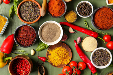 Composition with fresh aromatic spices on color wooden background