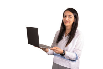 Holding modern laptop, young beautiful caucasian woman holding modern laptop. Isolated on white background. Portrait of casual female with long brown hair. Looking to camera, smiling and standing.