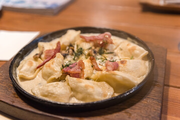 Delicious gnocchi with cheese and bacon