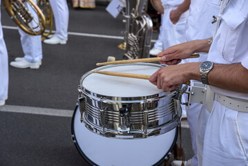 Drummers marching on the city street parade