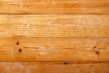 Fototapeta premium The background is made of wooden unpainted boards, horizontally. Top view