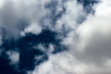 large isolated clouds in a blue sky 