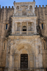 Fototapeta na wymiar Renaissance Porta Especiosa on the North façade of the Old Cathedral of Coimbra (Portuguese: Sé Velha de Coimbra)