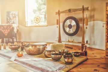 beautiful tibetan bowl and gong , ceremonial space. - obrazy, fototapety, plakaty