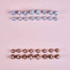 Gold and silver chess pieces, top view.