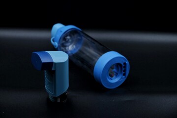 An inhaler with a spacer device. Spacer devices are used for effective medicine absorption in...