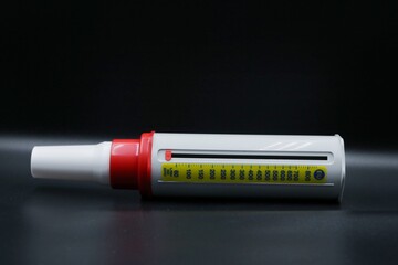 A peak flow meter is attached with a disposable mouthpiece. Peak flow test used in the treatment of...