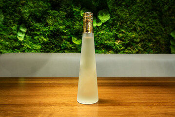 a bottle of japanese sake on wooden table