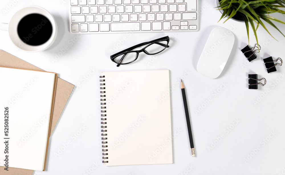 Poster Flat lay of top view desk work table with computer notebook coffee and pencil work space in minimal white tone concept includes copyspace for add text or graphic