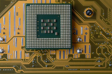 microprocessor from the computer lies on the motherboard. close-up. view from above
