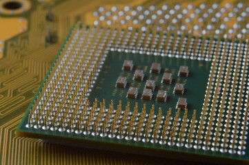 microprocessor from the computer lies on the motherboard. close-up