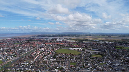 Aerial view of buildings and houses with a cloudy sky background. Taken in Fleetwood Lancashire England. 