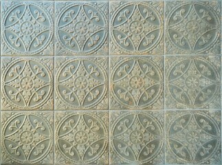 Elegant historical ceramic tiles on the floor and walls of the building. Architectural elements for interior decoration.