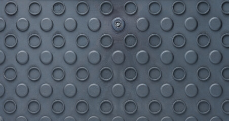 Abstract gray plastic texture with round bumps, full frame